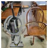 Wood office chair and Kirby sweeper
