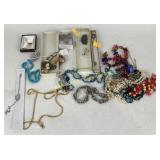 Costume Jewelry Including a Jade Stickpin, Brooche