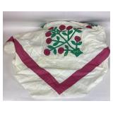 Pink flower quilt top, stained