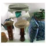 Bird Feeders, Watering Can, and Decorative Pillows