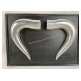 Sculptural Wall-Mounted Aluminum Horns on Black Di