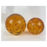 (2) Amber controlled bubbles paper weights