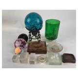 Blue bubble glass orb and metal stand.  Green