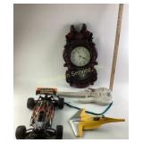 Wall Clock, RC Car, Plastic Guitar, and Yellow Toy