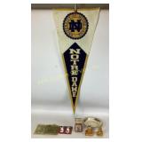 Norte Dame pennant, Garfield toy and candle,