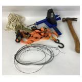 Husky claw hammer.  Ratchet strap.  Rope.  Wire.