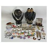 Costume jewelry: coin necklace, gold toned bow