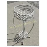 White metal plant stand. Good condition. 13 1/4