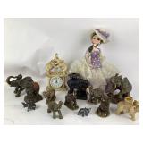 Elephant figurines, stone elephants, candle