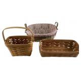 two Longaberger baskets. One is a 1996 edition