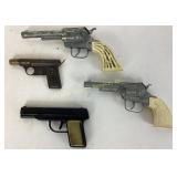 Knickerbocker plastic toy gun, three other toy