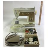 Singer sewing machine, touch and so, with