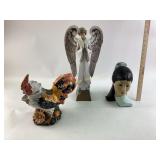 A rooster pitcher, head figurine,and a angel, it