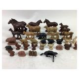 Painted farm animals, rubber horses, chickens and