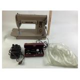 Singer sewing machine with power cord and