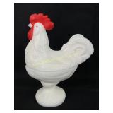 A rooster on a nest, milk glass and good