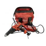 Milwaukee bag with Milwaukee reversing drill and