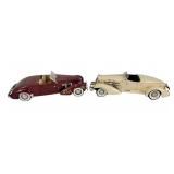 Pair of 2 1:18 scale diecast car models. Year and