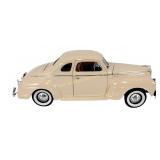 Diecast 1:18 1941 Plymouth model, appears to be
