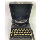 Remington Portable Typewriter with cover.