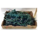 Multiple strands of Christmas lights with power