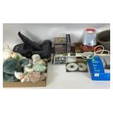 Energizer lantern light.  Linksys router in box.