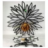 Metal swinging wall sconce, metal flower, sun