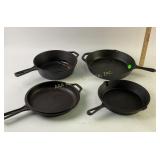 Cast iron skillets one with dried oil in