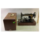 Singer sewing machine with sphinx design