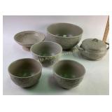 Embossed vine and branch pottery bean pot, mixing