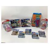 Assorted Batman & Pokï¿½mon figurines
