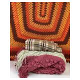 Two (2) beautifully handmade afghan blankets & a