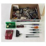 Various tools: screwdrivers, chisel, drillbits,