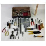 Various tools: wire cutters, chisel,