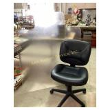 Swivel office chair with rolling casters. No rips