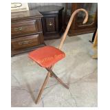 Walking stick stool with orange vinyl seat : 29in