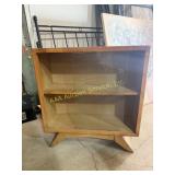 MCM blonde wood bookcase with sliding glass doors