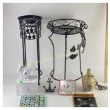 Two (2) wrought iron plant stands 24 in & 26 in