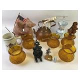 Copper kettle, amber glass shades, terracotta scul