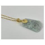 Carved jade pendant necklace