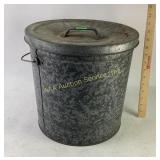 Galvanized metal storage bin with lid and handle.