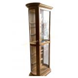 Rounded lit curio cabinet. Has key. 6ft tall x