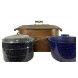 Copper boiler tub with lid and enamelware pots.