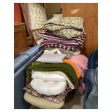 Large stack of blankets, rugs, sheet sets &