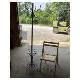 Black 2 pc coat rack, has cracked base. Possibly