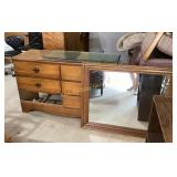 Chest of drawers with detachable vanity mirror.