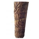 Handcarved Totem Pole. Solid tree trunk with