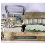 Warps plastic wrap, beach chair, pillows, blanket