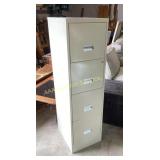Beige 4 drawer filing cabinet. 52in tall x 15in