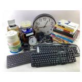 Keyboards, CD Spindles, Computer Books, and Wall C